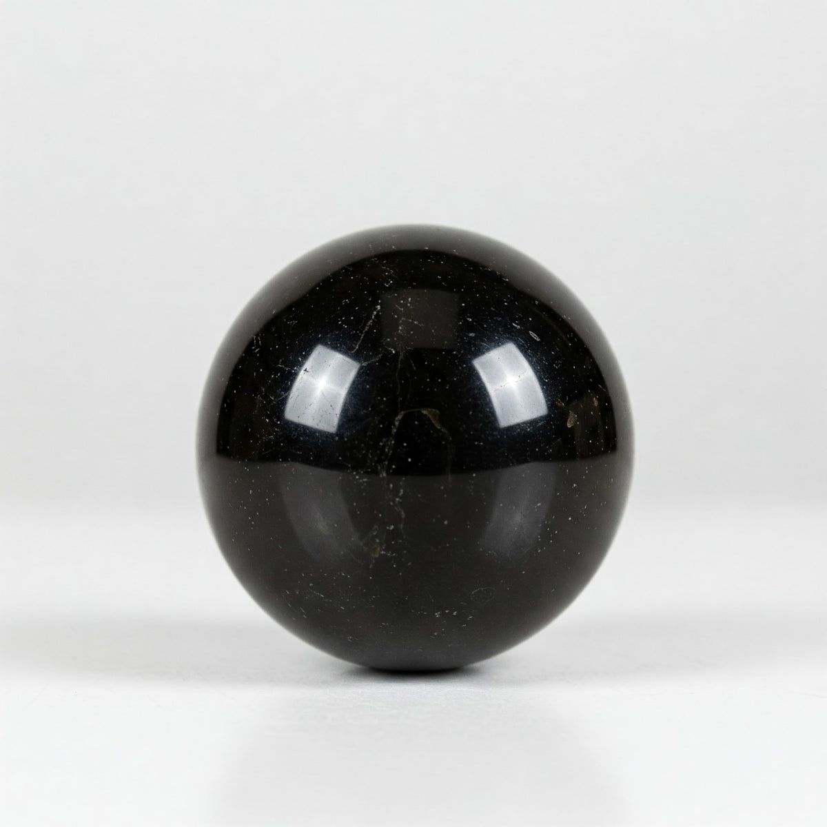 Black Obsidian Crystal Spheres: Grounding, Protection, and Transformation