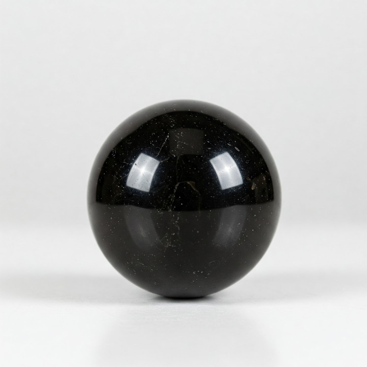 Black Obsidian Crystal Spheres: Grounding, Protection, and Transformation